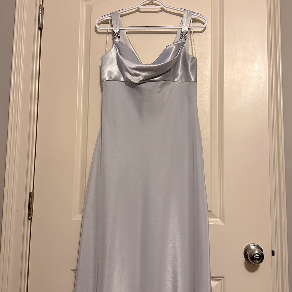 Large Silver floor length gown.